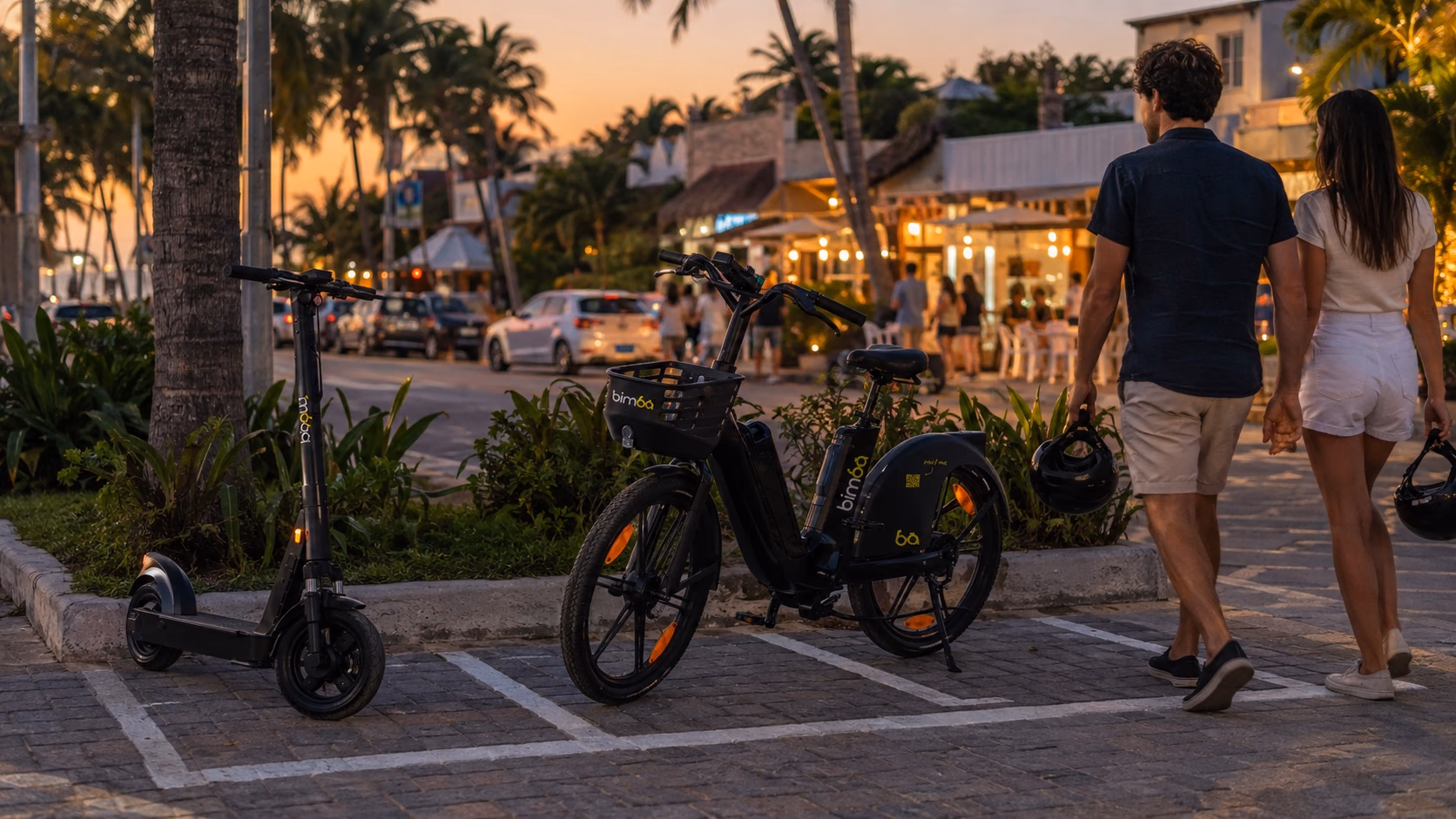 Bimba e-bike and scooter parked before a sunset dinner in Santa Teresa