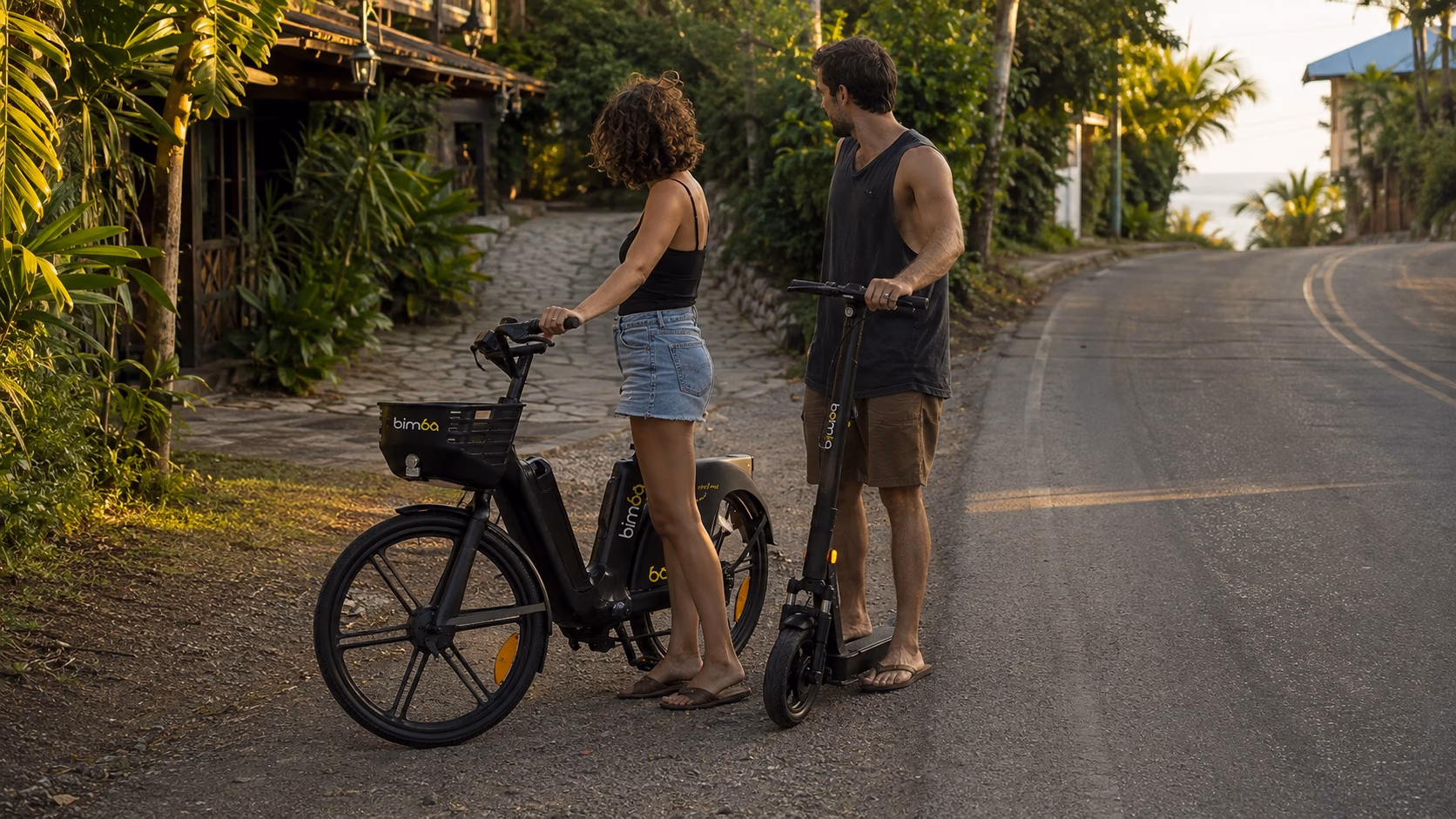 Travelers assessing a hillside access road with Bimba e-bike and scooter near Mal País