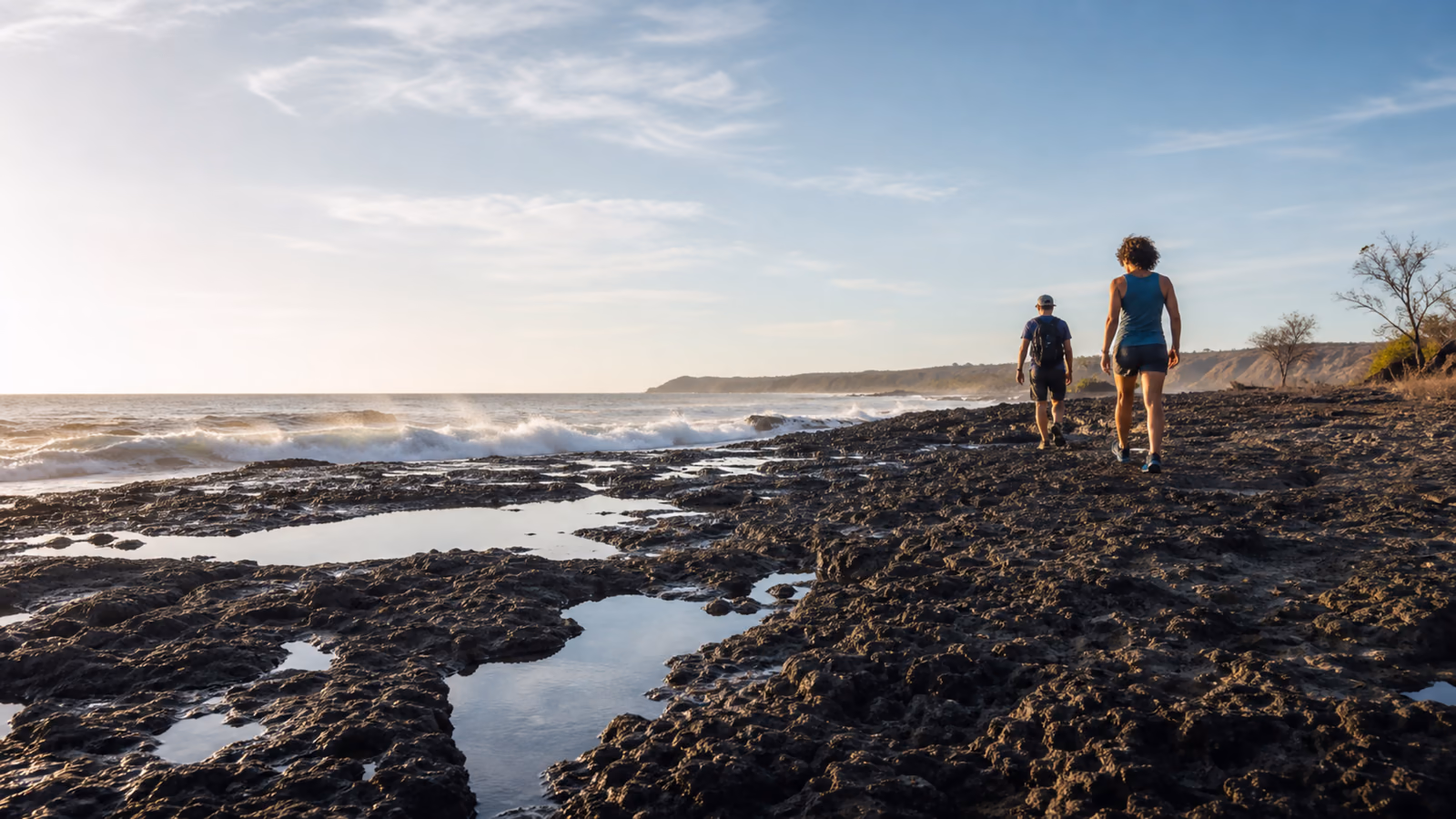 Natural tide pools on the rocky Mal Pais coast at low water