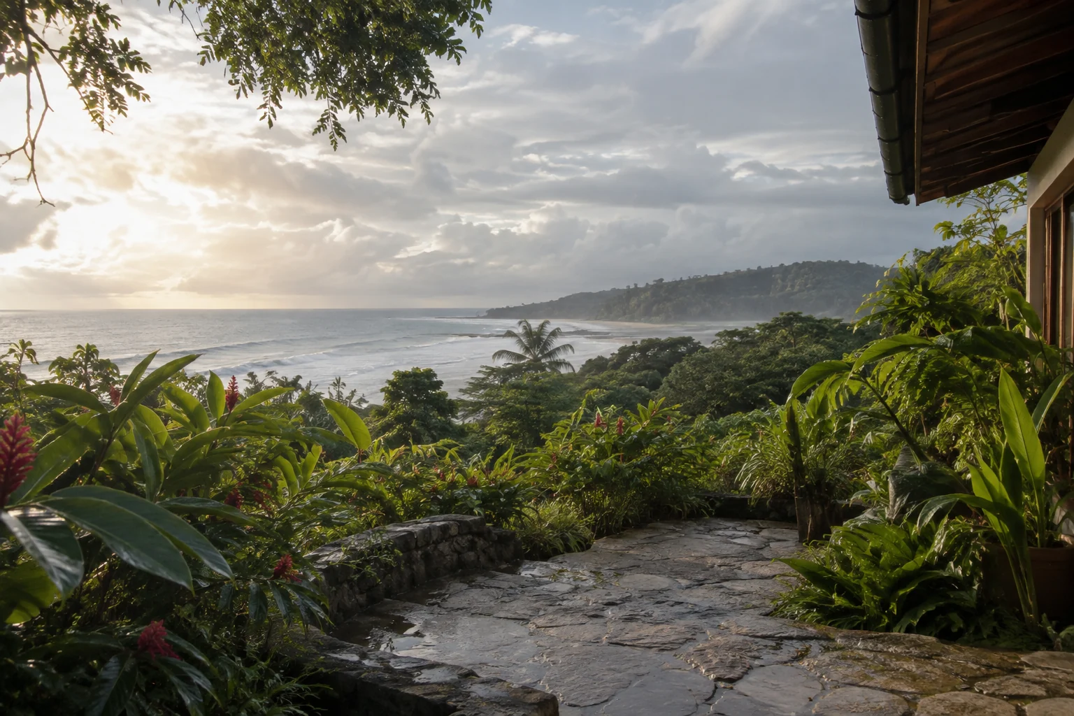 Sunlight breaking through clouds over a damp coastal garden