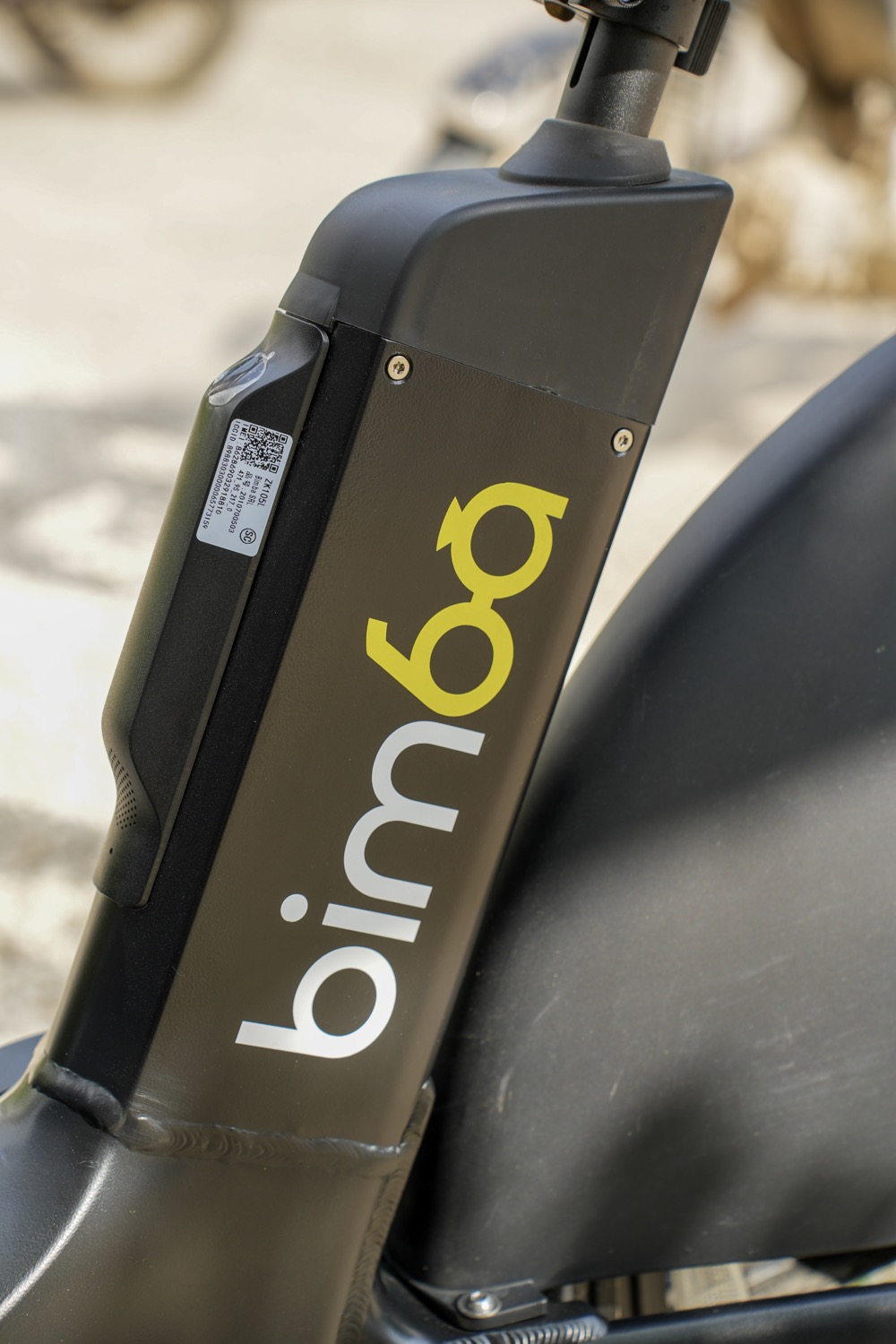 Original white and yellow Bimba branding on a bicycle frame